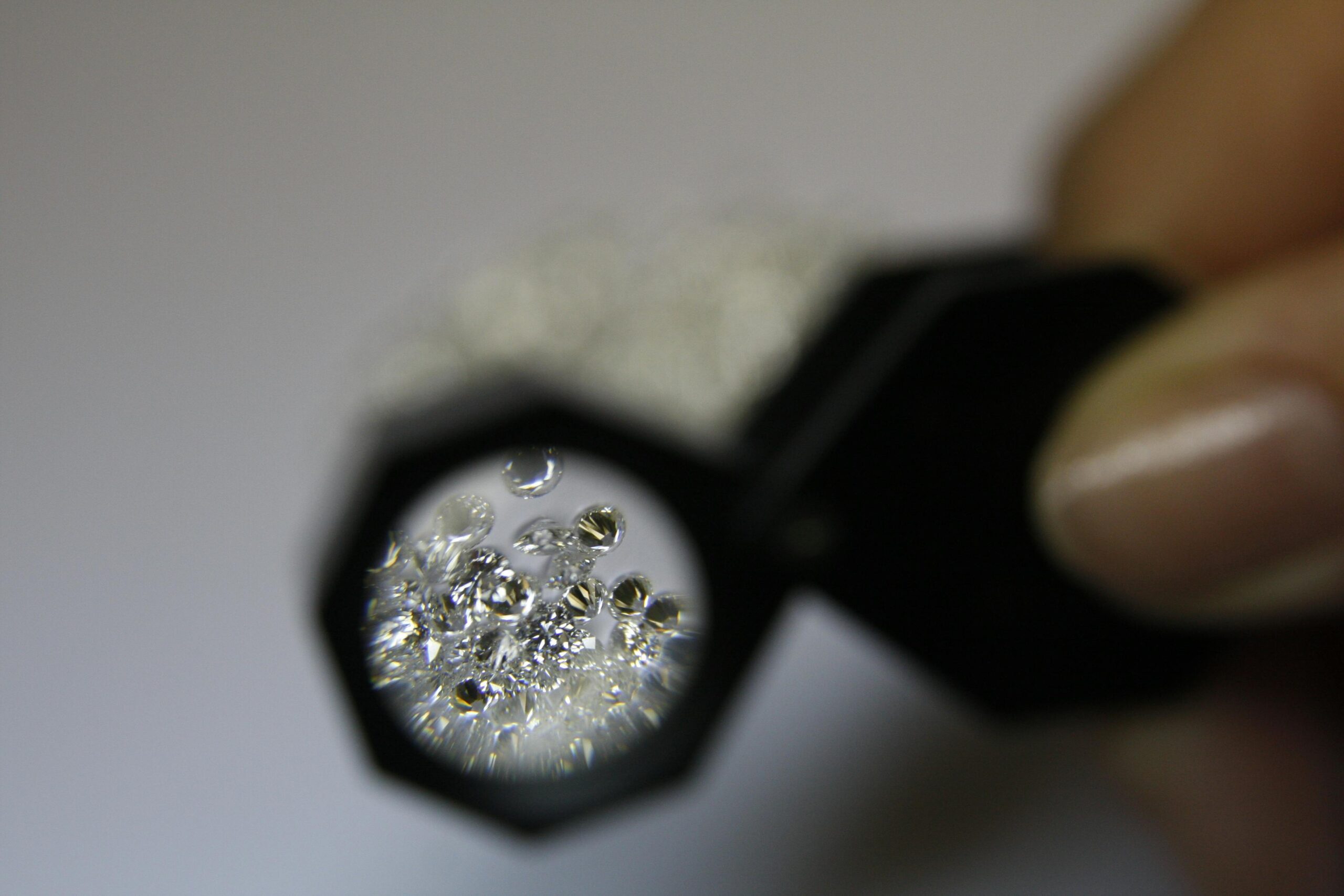 jeweler's loupe. It's a small, handheld magnifying lens that helps jewelers inspect gems and jewelry.